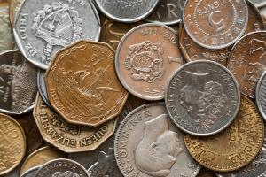  a range of coins of variouus colours denominations and nations