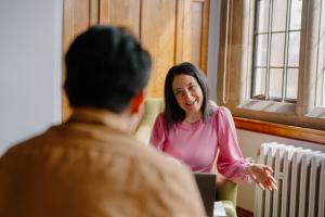 A student meeting and chatting with their Personal Tutor