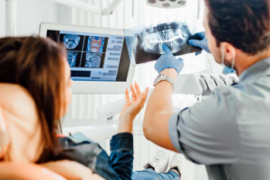 Doctor showing patient scans