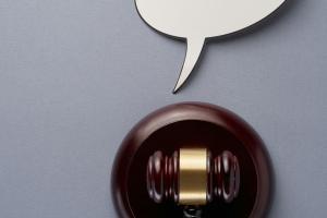 Picture of a gavel and a message bubble