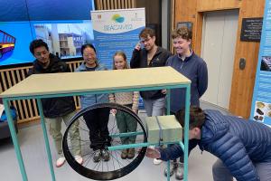 students trying out the wave machine
