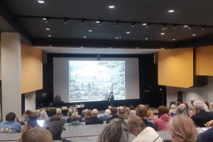 Photograph of a crowded lecture theatre