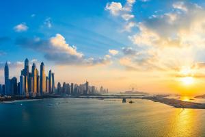 Cityscape with sunrise and blue sky