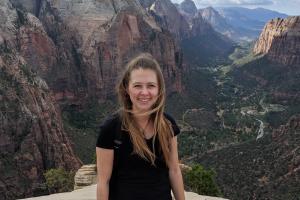 Whitney Fleming with a valley in the background