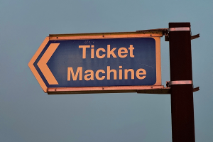sign for the ticket machine