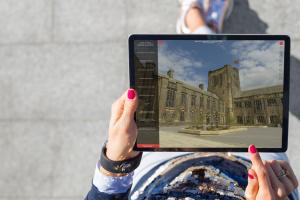 Mockup of student using Virtual Tour on an ipad whilst exploring the site