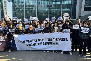 Environment activists calling for a strong global plastics treaty in Busan, South Korea, December 2025. 
