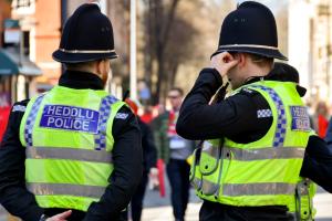 Two North Wales Police Officers from behind