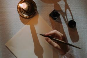 Iamge of Nineteenth-Century Literature being written in candle light 
