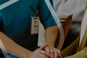nurse holding hands with a patient