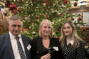 Mark Maguire and Lucy Deakin both students, and Tracey Horton, Director of Bangor University Legal Advice Clinic in the centre
