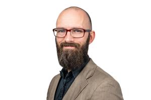 Portrait photo of Dr James T Bragg