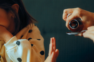 Child refusing medicine 