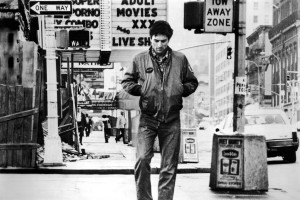 The iconic image from Taxi Driver of loner Travis Bickle, played unforgettably by Robert De Niro.