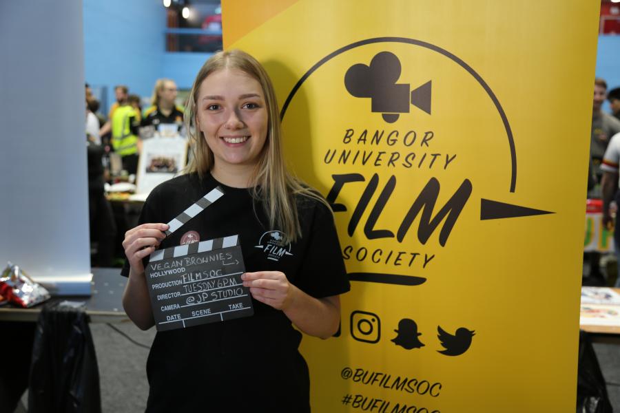 A student from the Bangor Film Society at the Serendipity Fair during Welcome Week