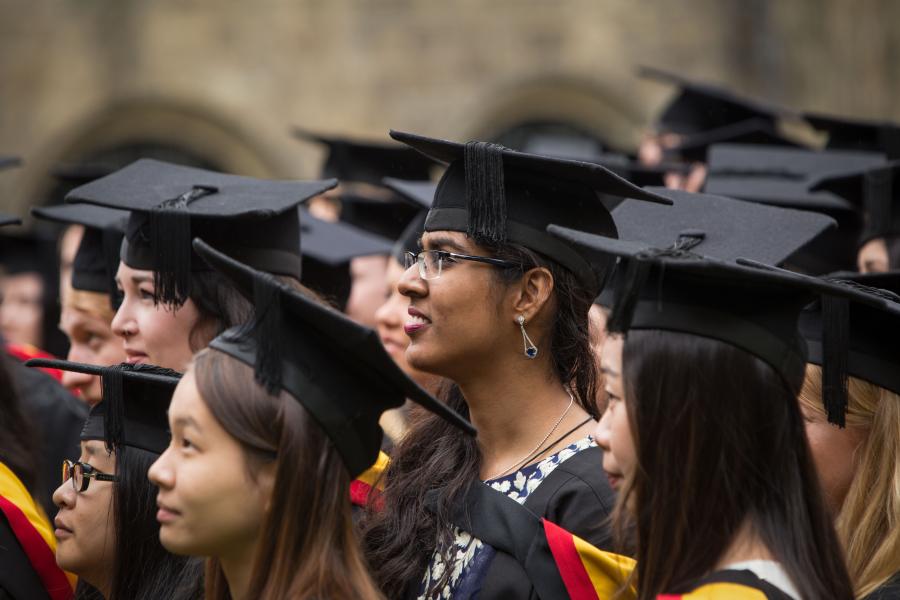 Students in their cap and gown at the graduation ceremony