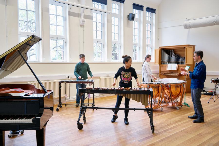 Students playing musical instruments