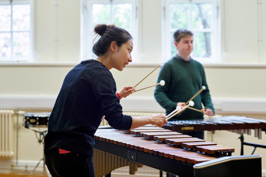 Students playing musical instruments