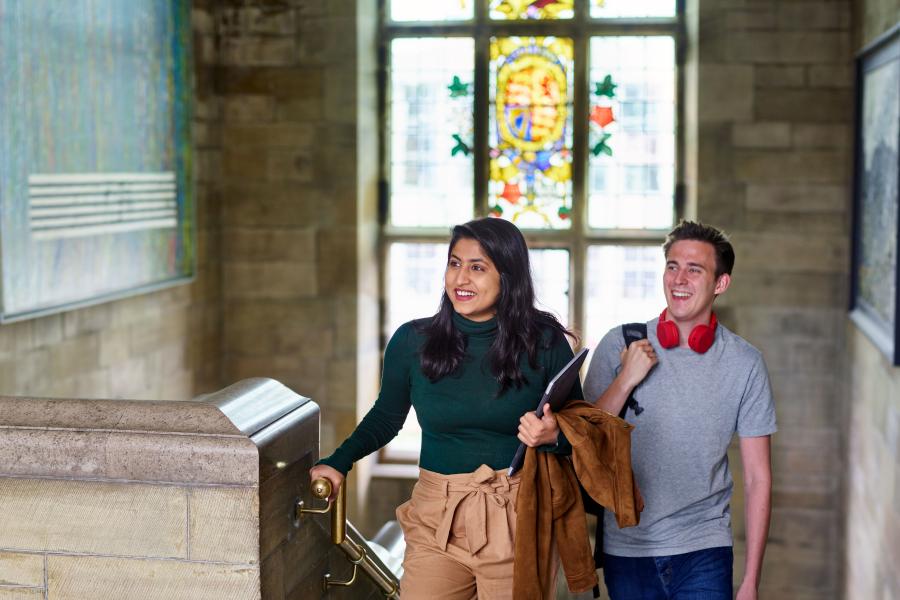 Students Walking up the stairs at the Main Arts Building