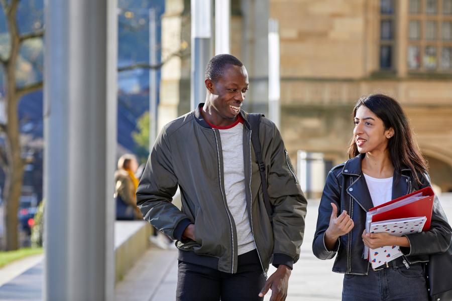 A couple of students walking between lectures