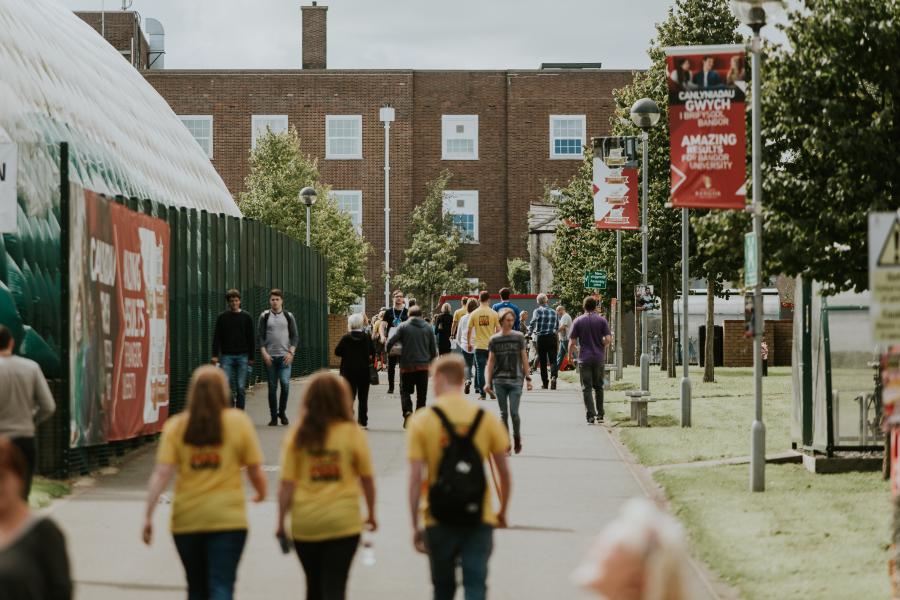 Peer Guides walking through the Ffriddoedd Student Village during Welcome Week