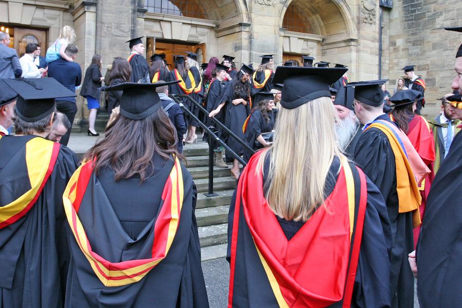 Students outside the Main Arts Building on graduation day