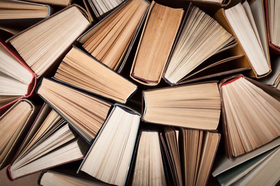 postgraduate creative writing uk Books stacked on their ends