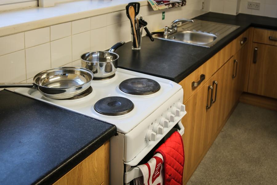 A shared kitchen in Glyder halls of residence at Ffriddoedd Student Village 