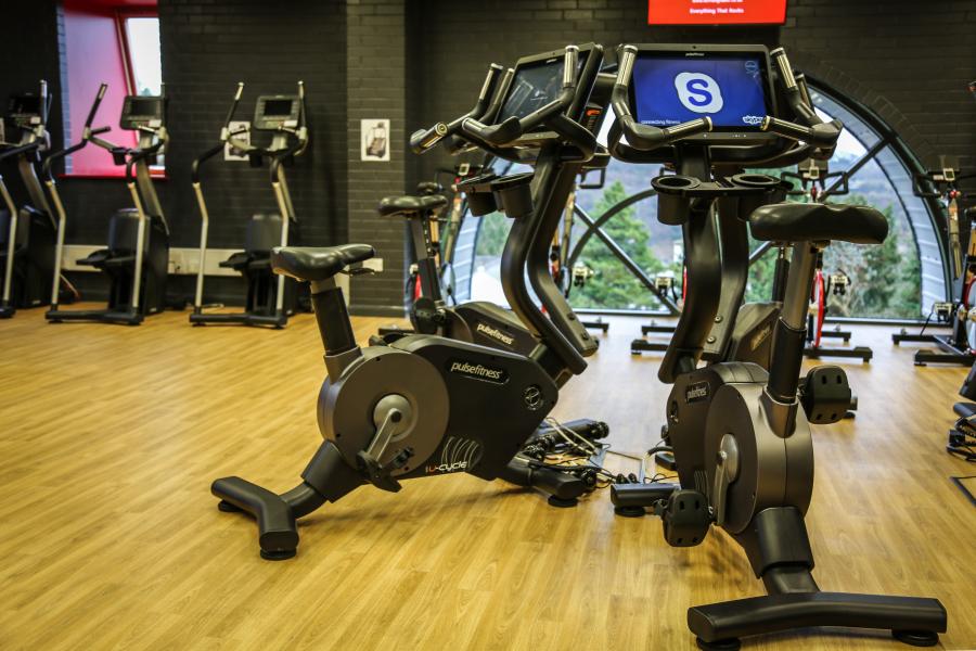 Exercise bikes at the gym in Canolfan Brailsford, Ffriddoedd Student Village