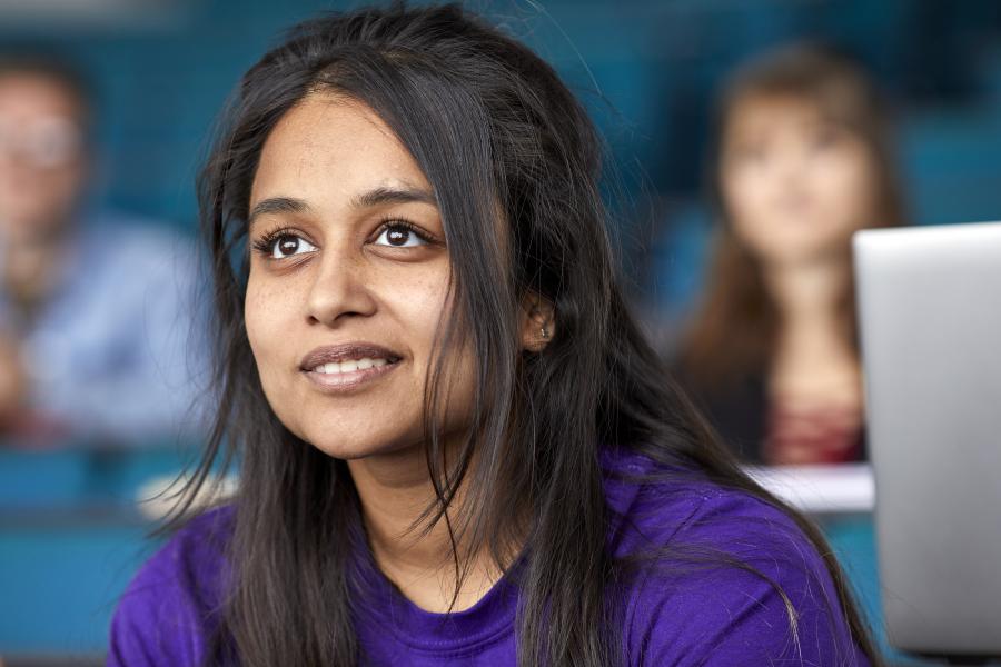 Student in Pontio lecture theatre 