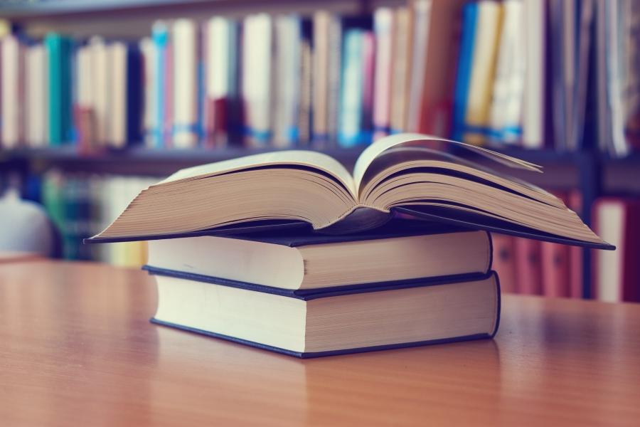 Open book on a table in a library