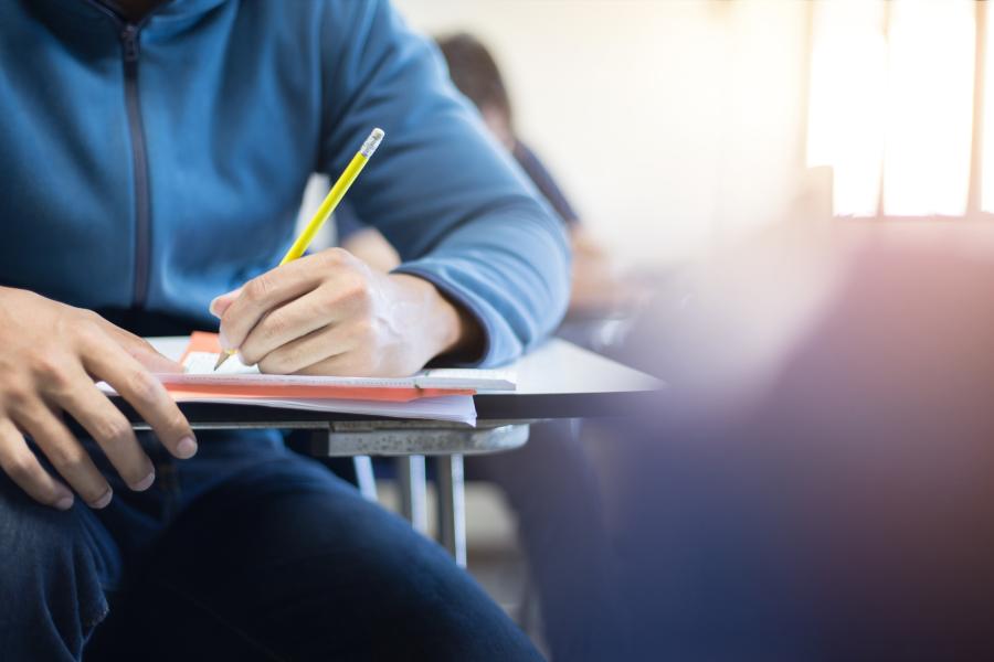 Photo of person writing notes