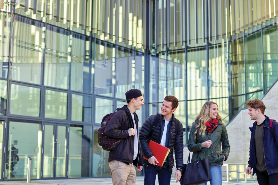 Students socialising outside Pontio