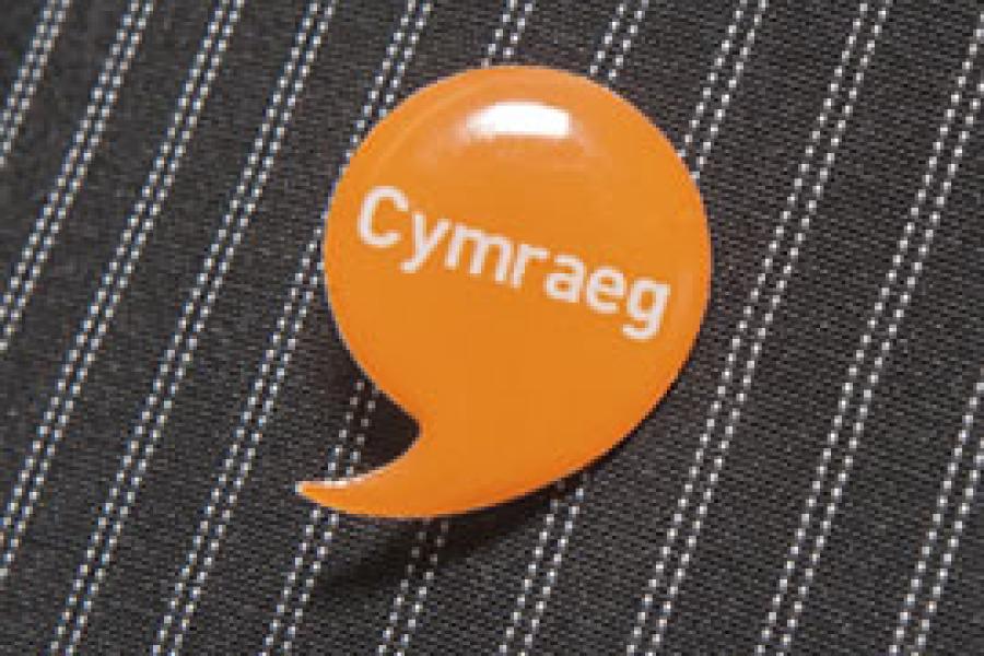 Iaith Gwaith badge 