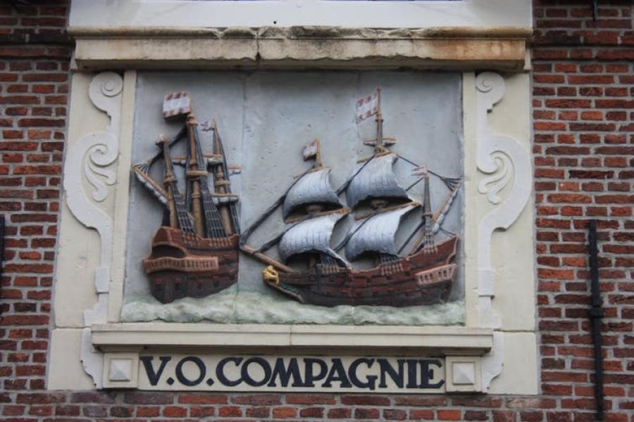 A plaque depicting two 17 century sailing ships