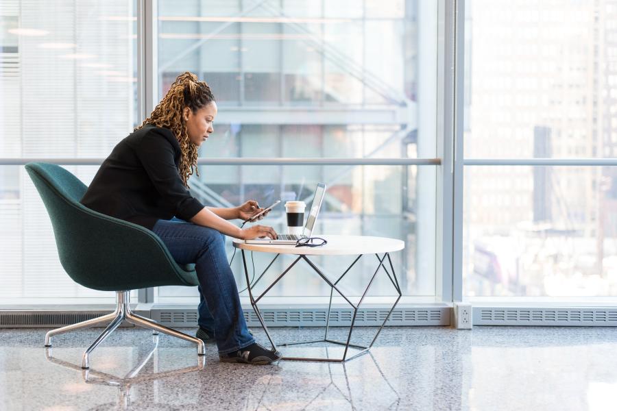 Woman working in social space 