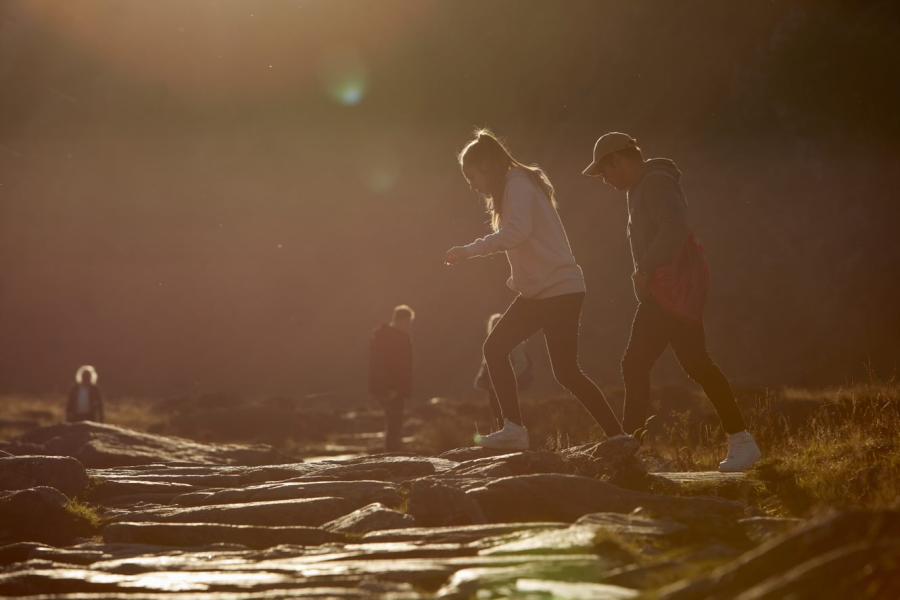 Two students walking in Snowdonia