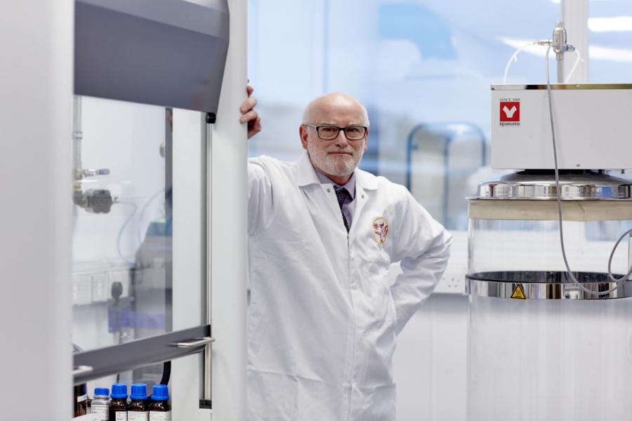 Professor Bill Lee in a white lab coat