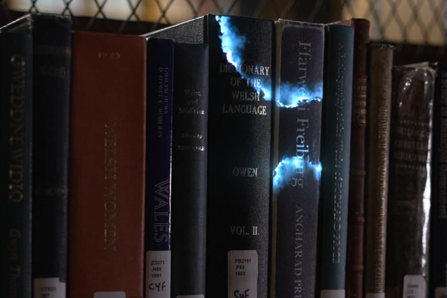 Close up of books in the library with magical sparkle effect