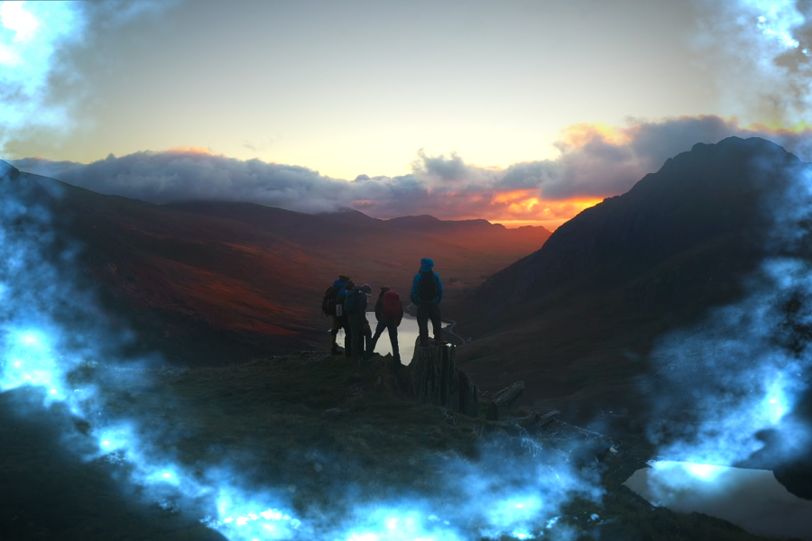 A still from Bangor University's Experience Magical TV advert, of Cwm Idwal, Snowdonia, with walkers admiring the view