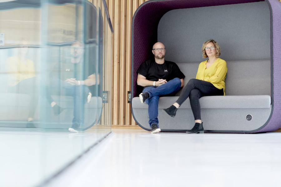 Haia staff sit on a sofa at M-SParc