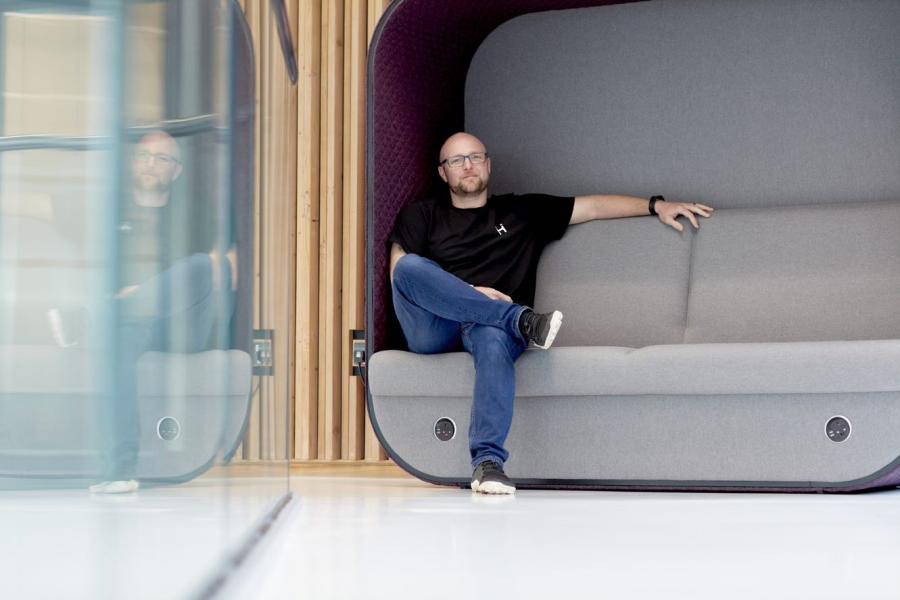 A man sitting on the sofa at M-SParc