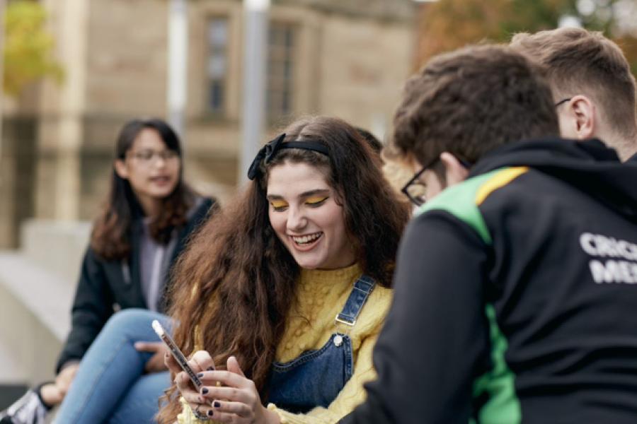 Students talking and laughing.