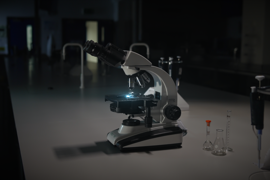 A microscope in a laboratory with magical effect