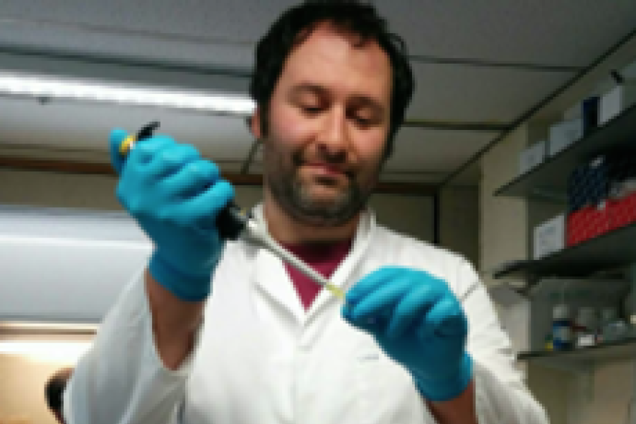 Dr Christopher Staples testing in a lab
