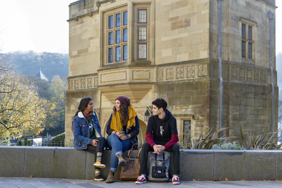 Students socialising outside Pontio