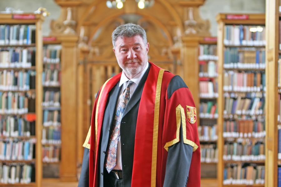 Nigel Short in Bangor University gown in Shankland Reading Room