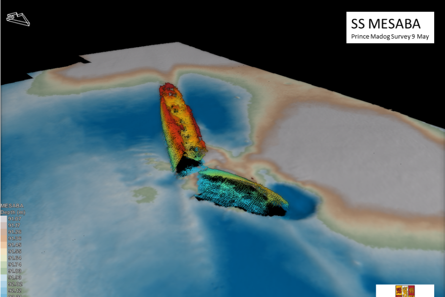 A coloured sonar image shows the shape of a ship lying broken in two