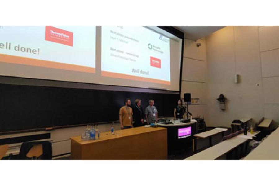 lecture given by Iwan and Franck in a lecture room with information being presented on the board