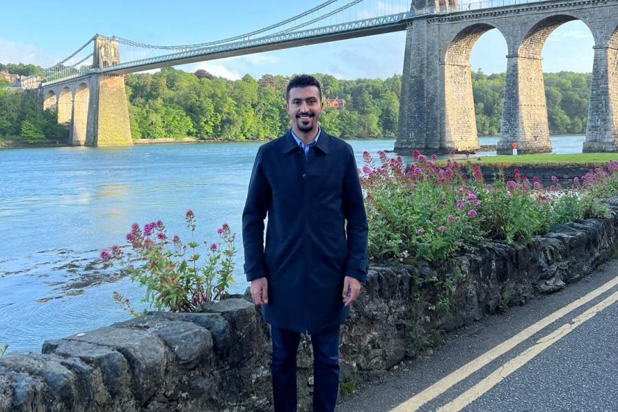 Ahmed Dhaif a Bangor University Graduate by the Menai Bridge.